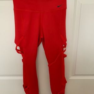 Red Nike leggings with mesh on the side